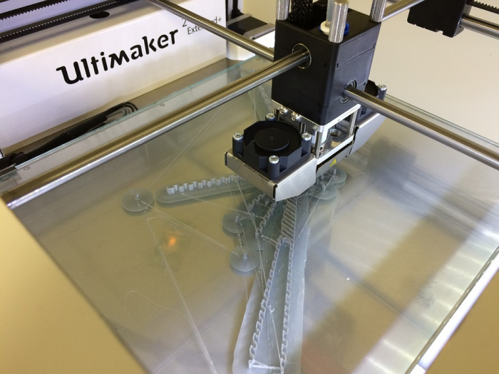 3D printer printing a plastic product