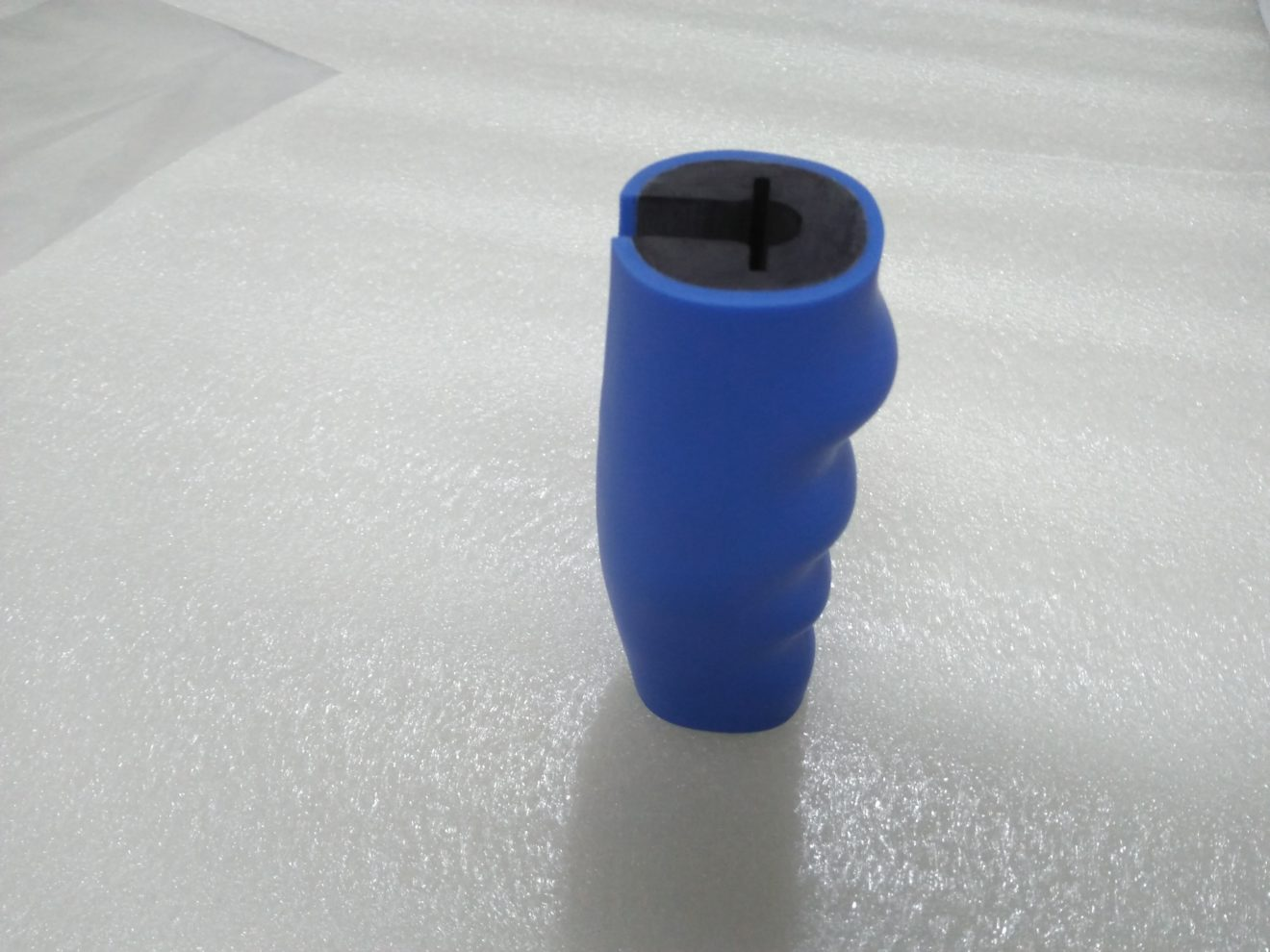 A blue plastic handle